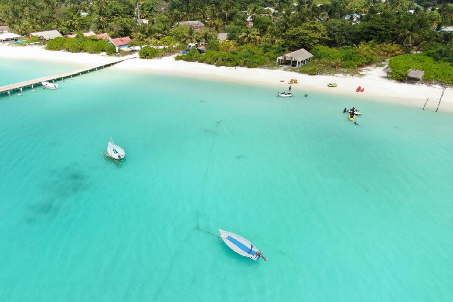 White beach meeting a shallow lagoon