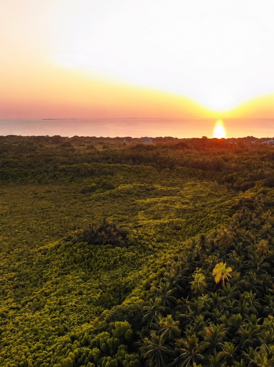 Sunset over the ocean from Emgrand